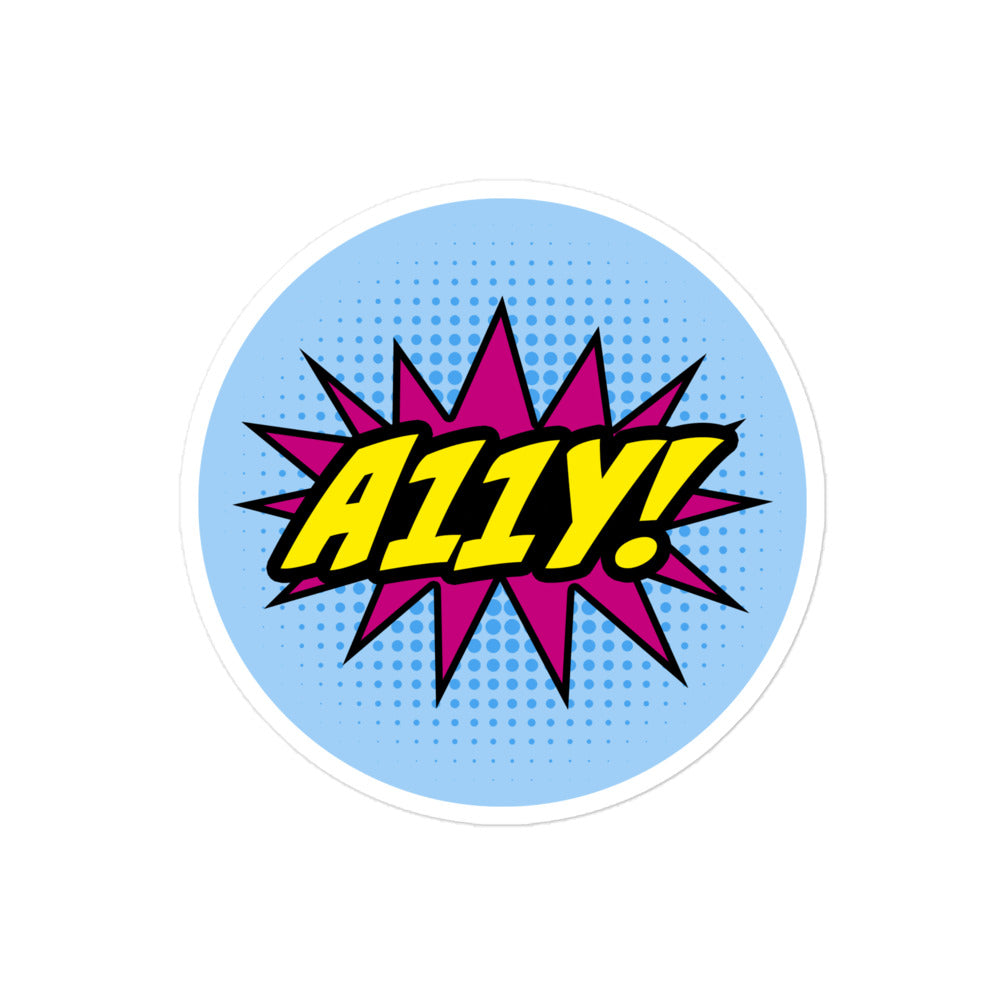 Comic book style logo. Bold, yellow A11Y! lettering with black outline on top of magenta star burst. Background is light blue halftone (dots), 4 inch round sticker.