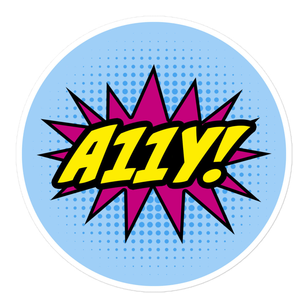 Comic book style logo. Bold, yellow A11Y! lettering with black outline on top of magenta star burst. Background is light blue halftone (dots), 5.5 inch round sticker.