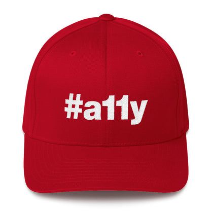 White, #a11y letters on front of red full-back baseball cap.