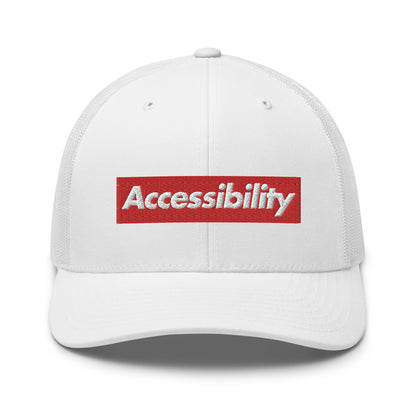 White, bold, slightly italic Accessibility word on red background, on white trucker hat with white mesh backing.