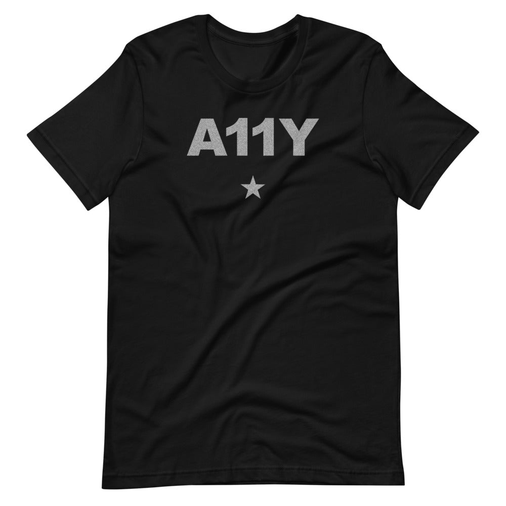 Silvery glitter, bold, A11Y letters, with silver star below, center aligned on black t-shirt.