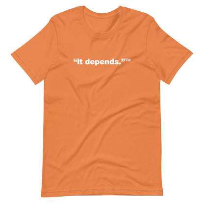 White It depends™ words, center aligned, on front of orange t-shirt.