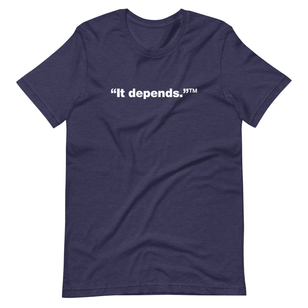 White It depends™ words, center aligned, on front of heather navy blue t-shirt.