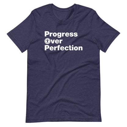 White, Progress Over Perfection, words, stacked, left aligned. 'O' in Over is round universal icon, on front of heather navy blue t-shirt.