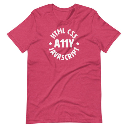 White HTML CSS JavaScript words, center aligned, circled around A11Y letters with stars on either side, on front of heather pink t-shirt.