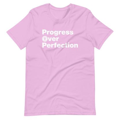 White, Progress Over Perfection, words, stacked, left aligned. 'O' in Over is round universal icon, on front of lilac (dark pink) t-shirt.
