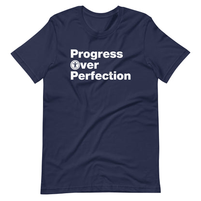 White, Progress Over Perfection, words, stacked, left aligned. 'O' in Over is round universal icon, on front of navy blue t-shirt.