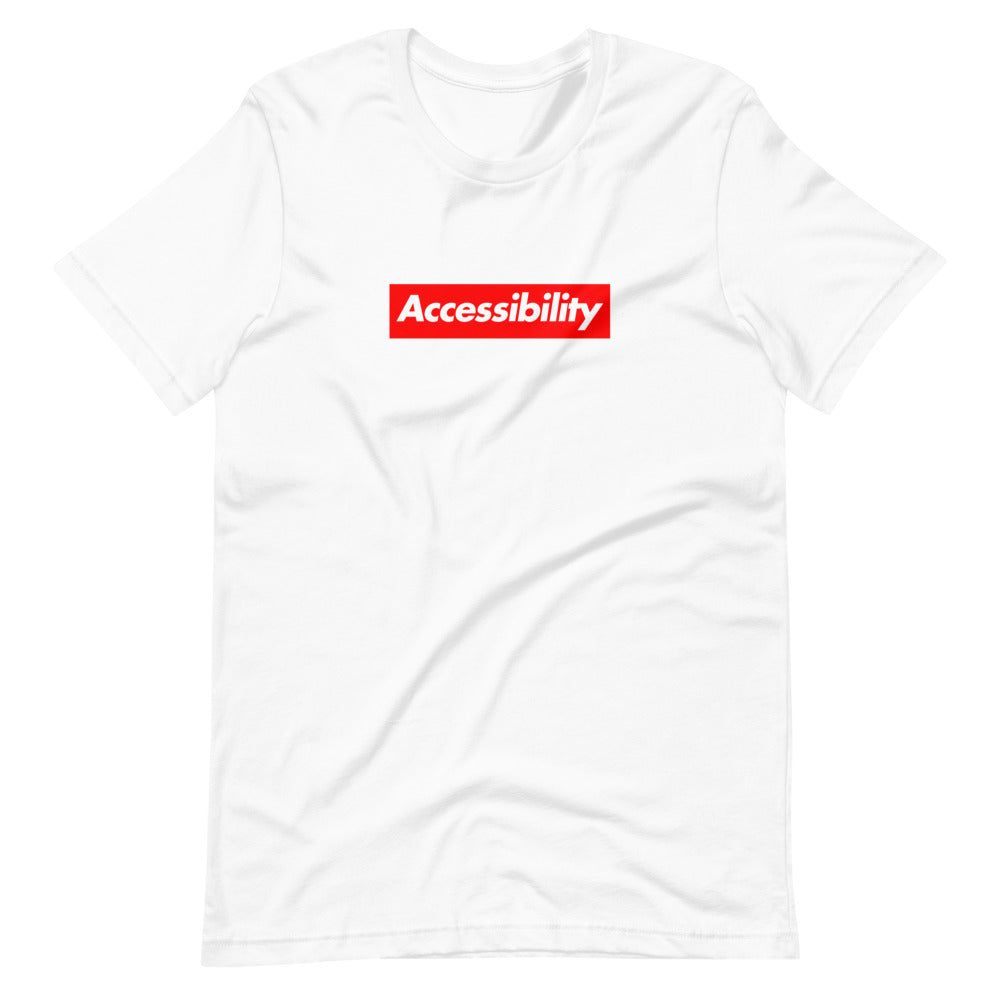 White, bold, slightly italic Accessibility word on red background, on white t-shirt.